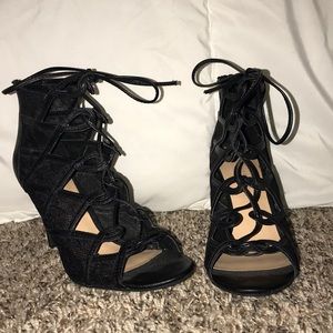 Black lace crossed up heels